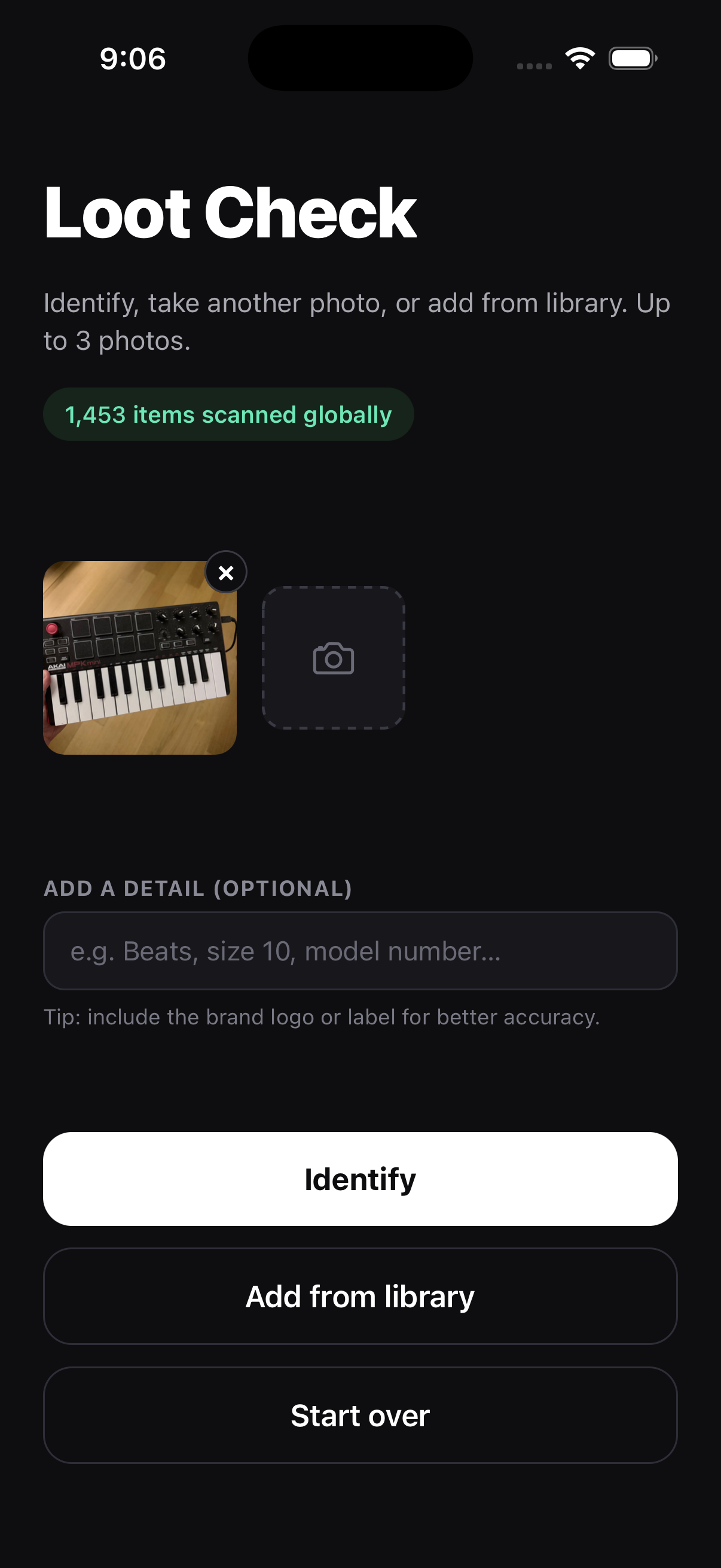 The home screen after a photo is added: a thumbnail of an Akai MIDI keyboard beside an empty slot for a second photo, an optional detail field with a tip to include the brand logo or label, and Identify, Add from library, and Start over buttons